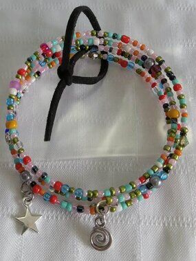 F - Handmade memory wire bracelets set with beads and pendants